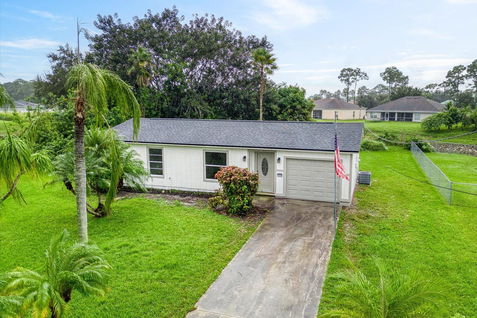 1400 Southwest Gilroy Road Port St. Lucie, FL 34953 - Photo 1 of 28 Front