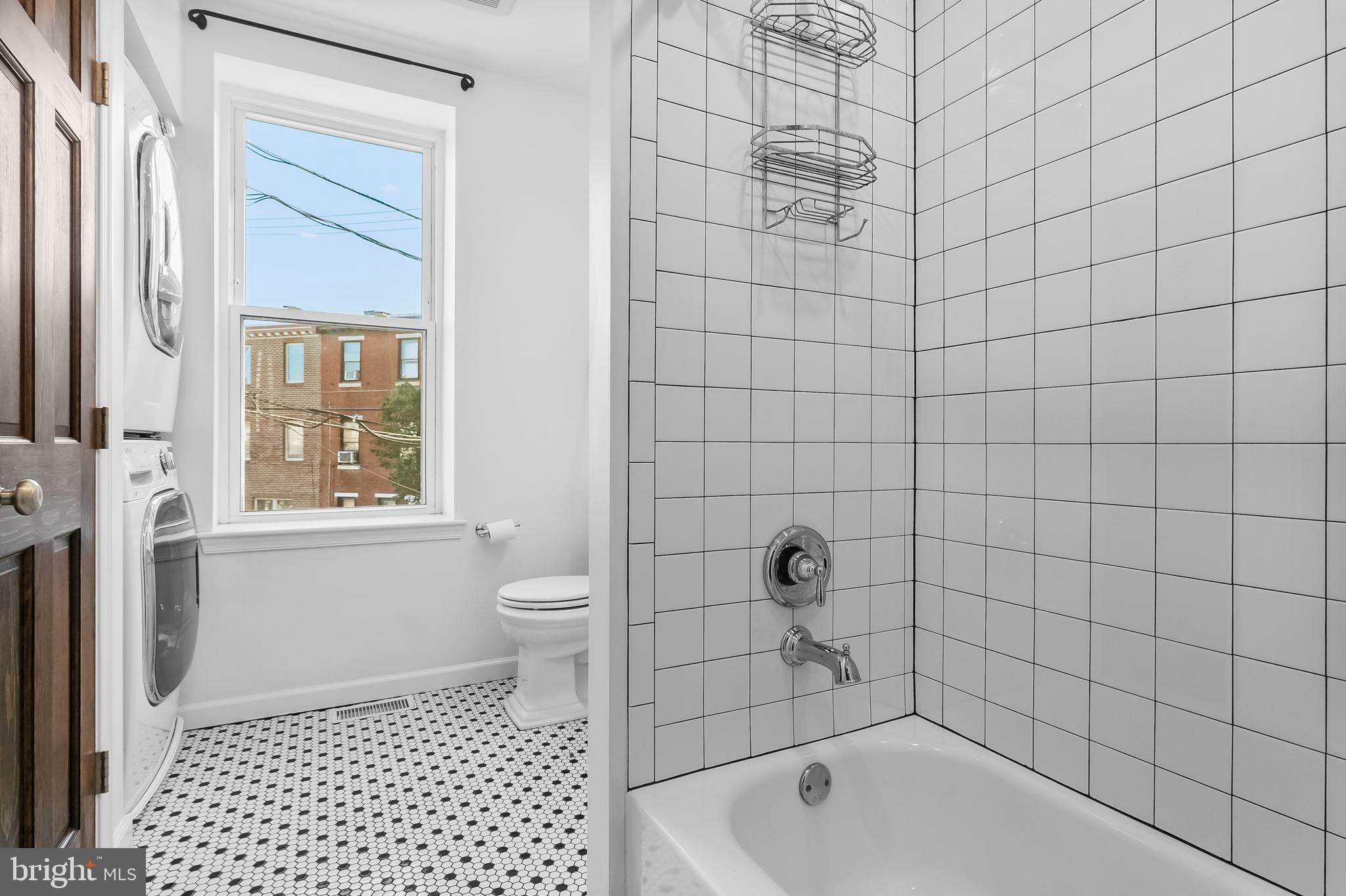 1120 O'Neil Street Philadelphia, PA 19123 - Photo 12 of 27 a bathroom with a bathtub and a shower