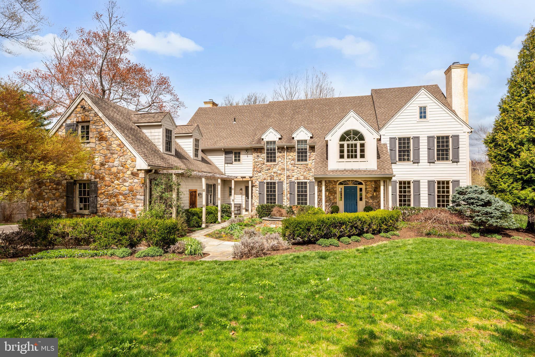 607 Newtown Road Berwyn, PA 19312 - Photo 2 of 83 a front view of a house with a yard