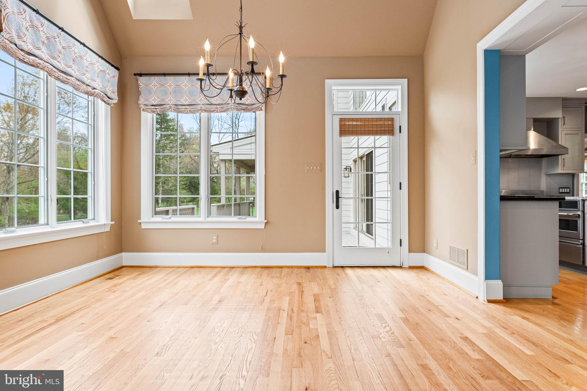 607 Newtown Road Berwyn, PA 19312 - Photo 29 of 83 a view of an empty room with wooden floor and a window