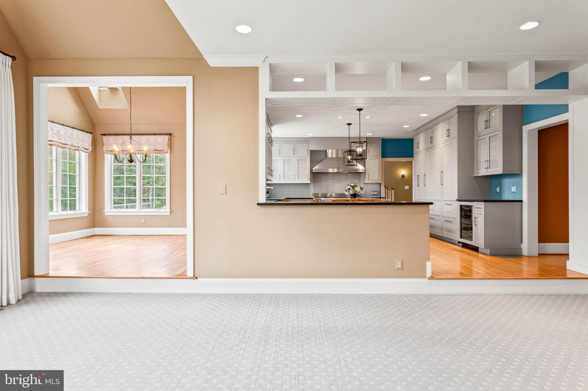 607 Newtown Road Berwyn, PA 19312 - Photo 33 of 83 a kitchen with stainless steel appliances granite countertop a sink a stove and a refrigerator