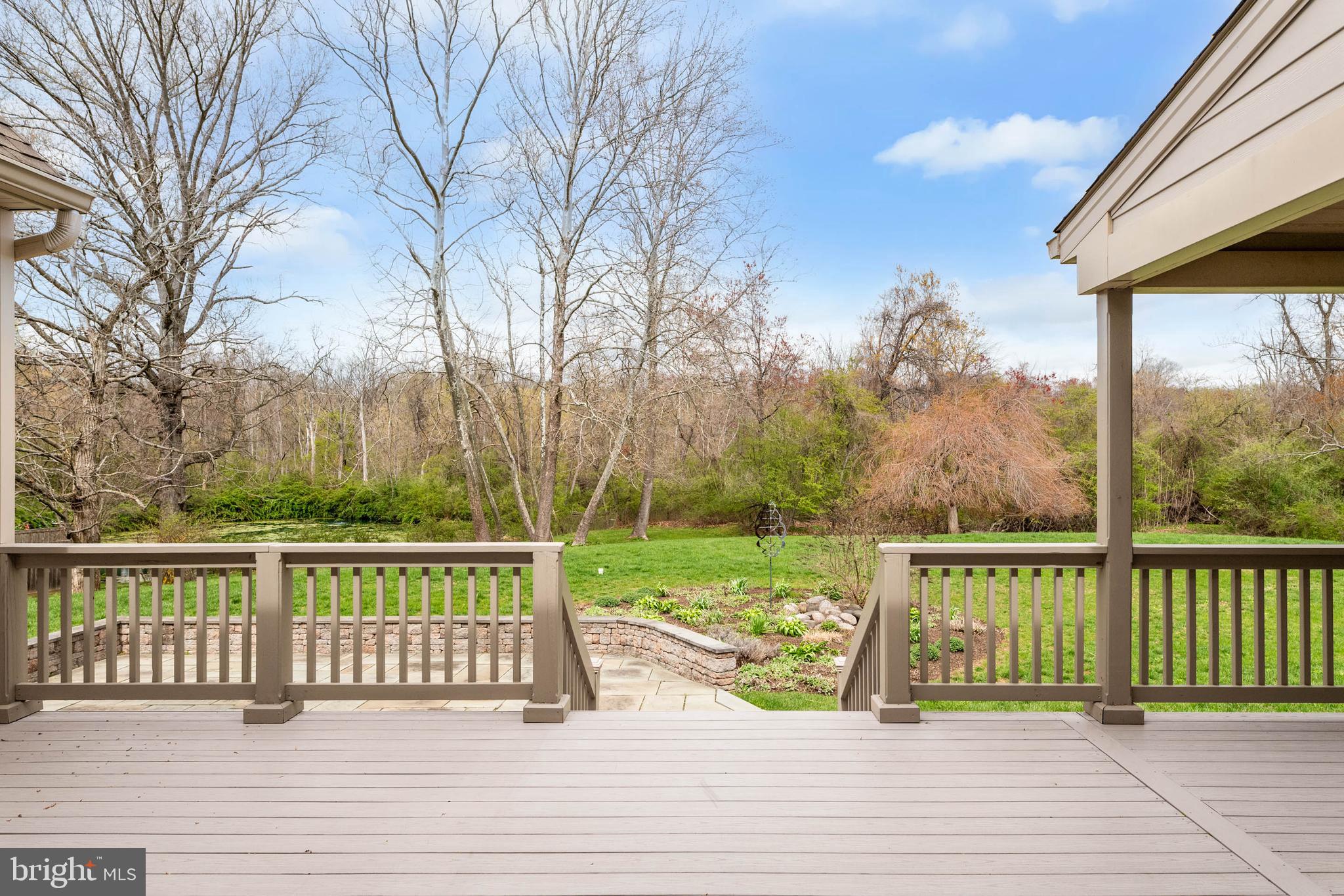 607 Newtown Road Berwyn, PA 19312 - Photo 71 of 83 a view of a deck with mountain view and wooden floor