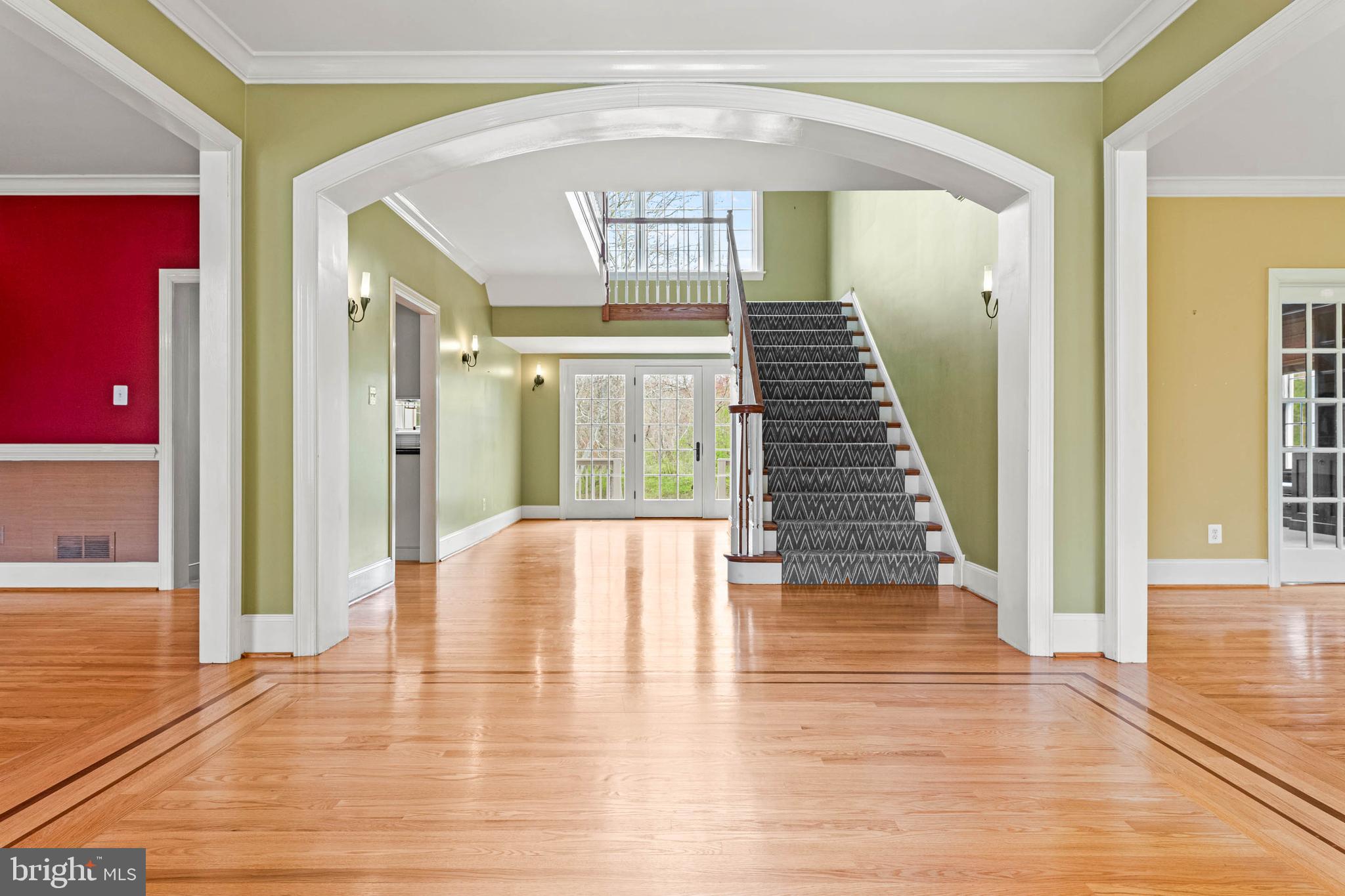 607 Newtown Road Berwyn, PA 19312 - Photo 10 of 83 a view of an entryway with wooden floor and door