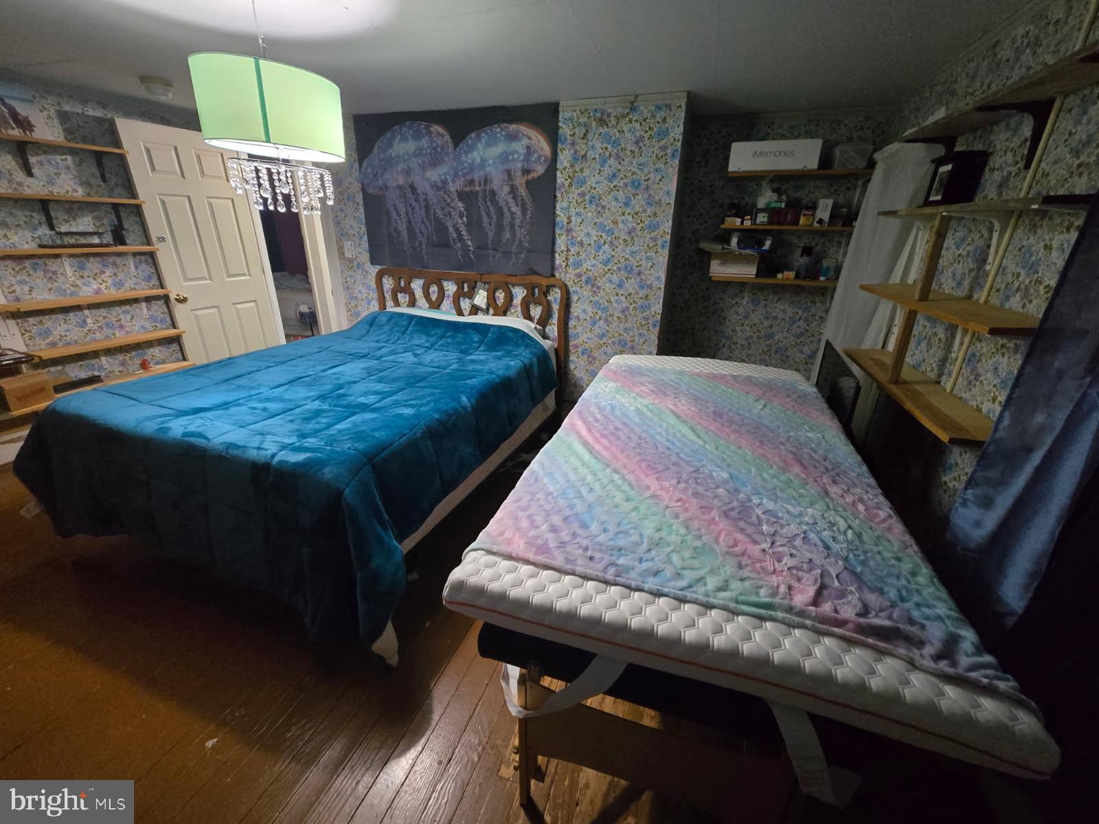 1511 Crocheron Road Crocheron, MD 21627 - Photo 28 of 55 a bed sitting in a bedroom next to a window