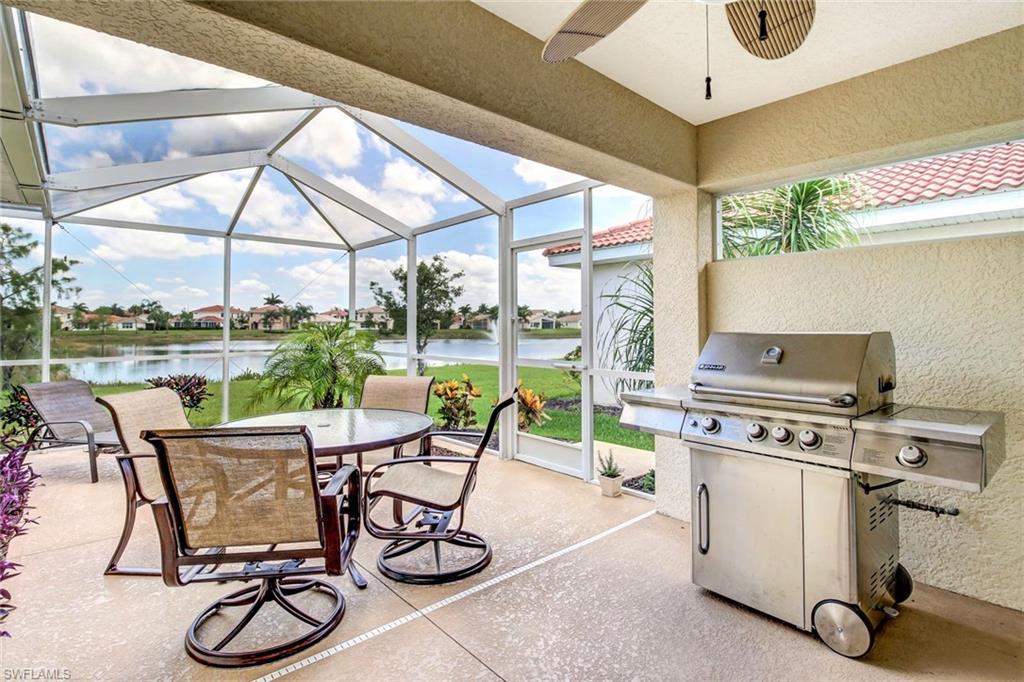 19667 Villa Rosa Loop Estero, FL 33967 - Photo 16 of 19 a view of a dining room with furniture window and outside view