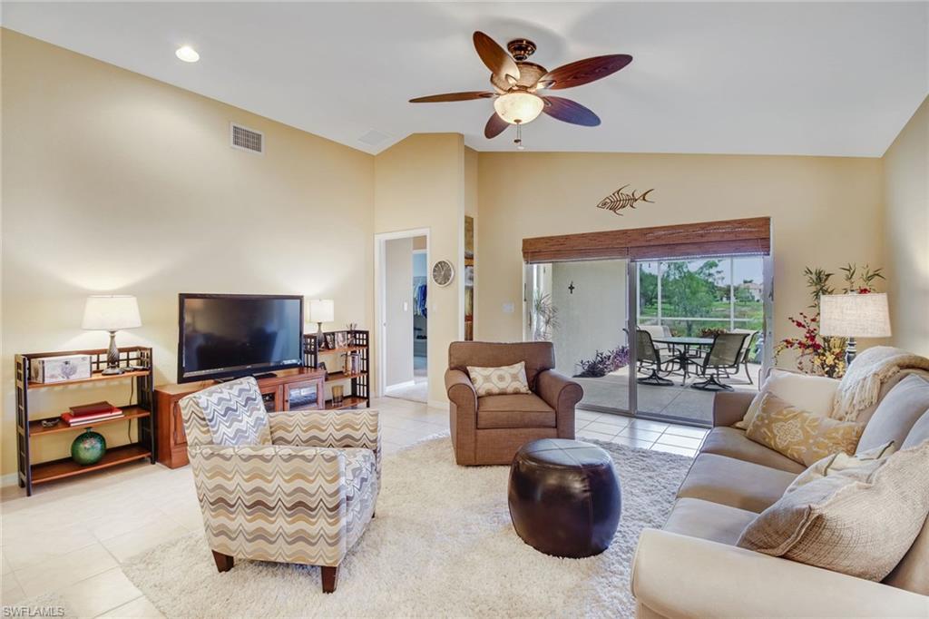19667 Villa Rosa Loop Estero, FL 33967 - Photo 8 of 19 a living room with furniture and a flat screen tv