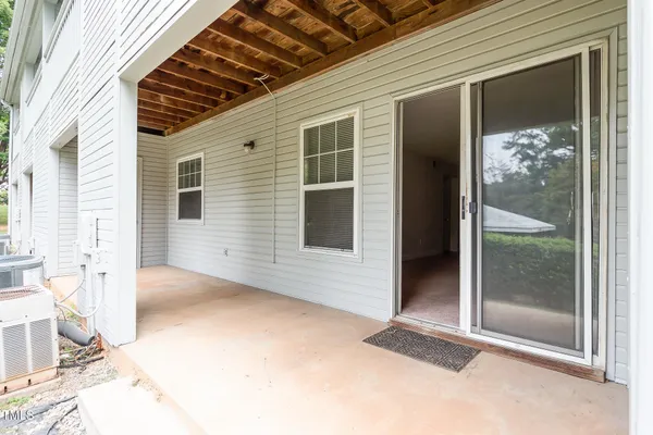 a view of backyard with large windows