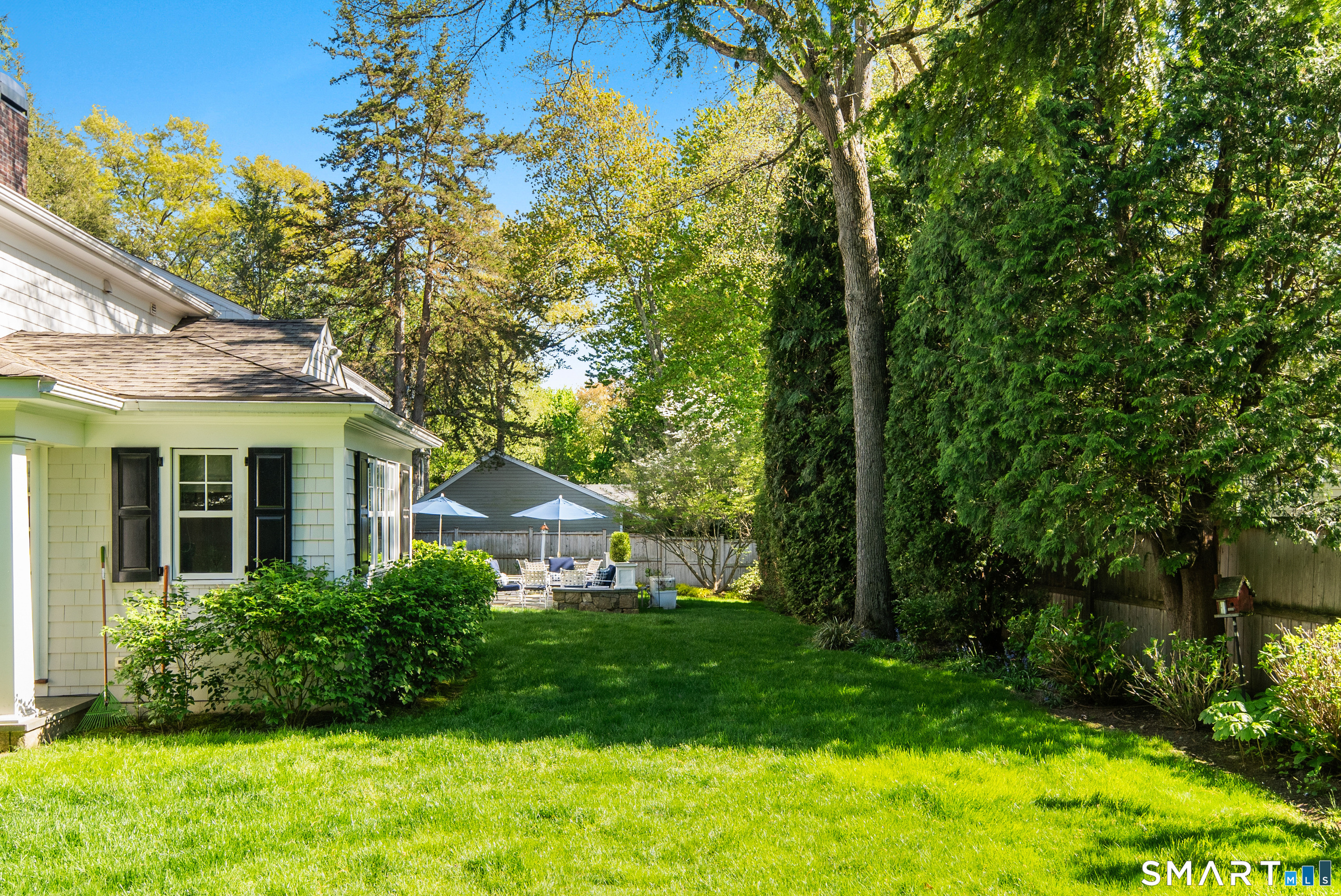 11 McLaren Road South Darien, CT 06820 - Photo 18 of 40 a view of a house with a yard