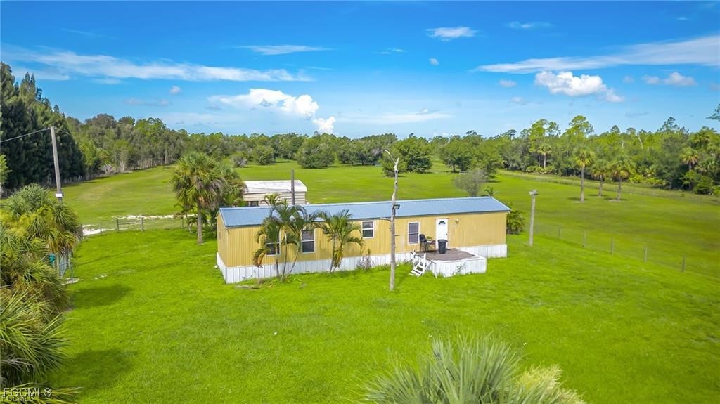 12031 Highway 31 Punta Gorda, FL 33982 - Photo 2 of 2 a view of a chairs and table in the garden