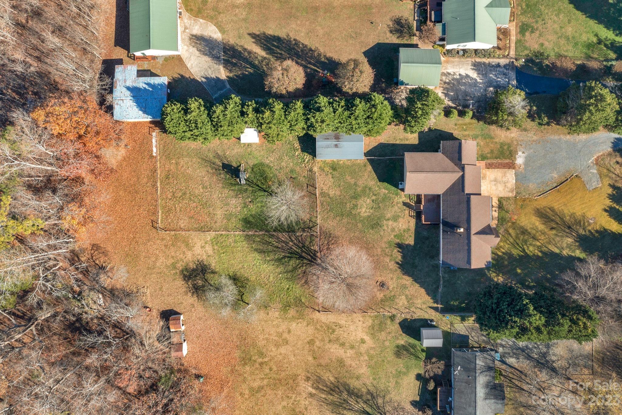 7861 Fisher Road Mount Pleasant, NC 28124 - Photo 4 of 48 an aerial view of residential houses with outdoor space