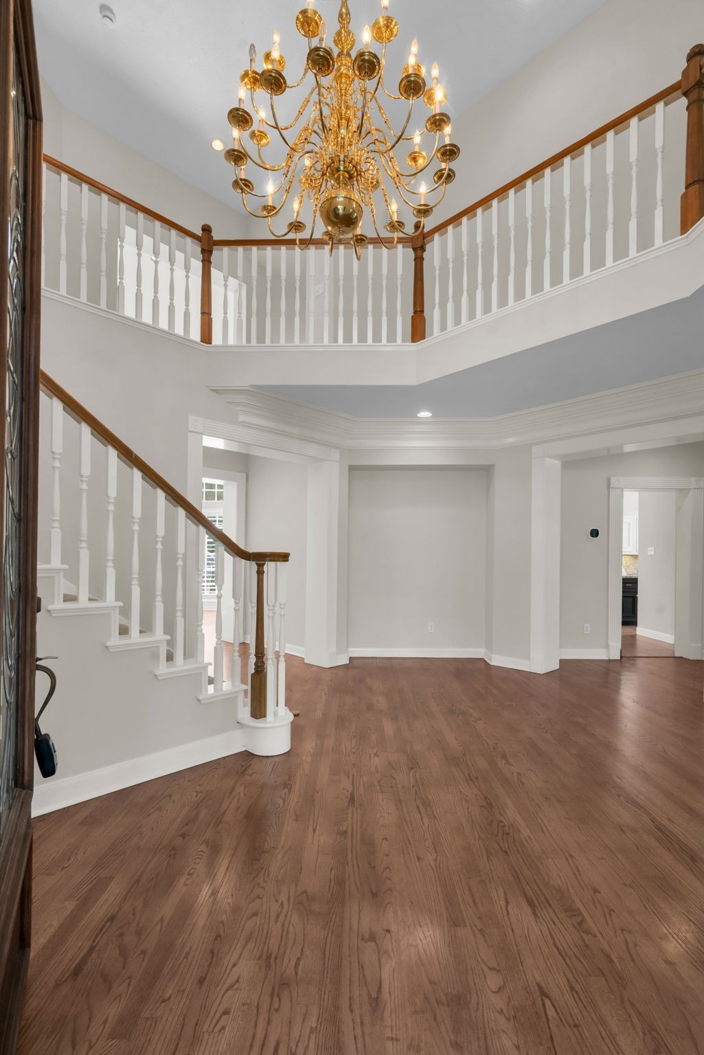 17302 Chagall Lane Spring, TX 77379 - Photo 5 of 44 Grand foyer featuring a statement chandelier