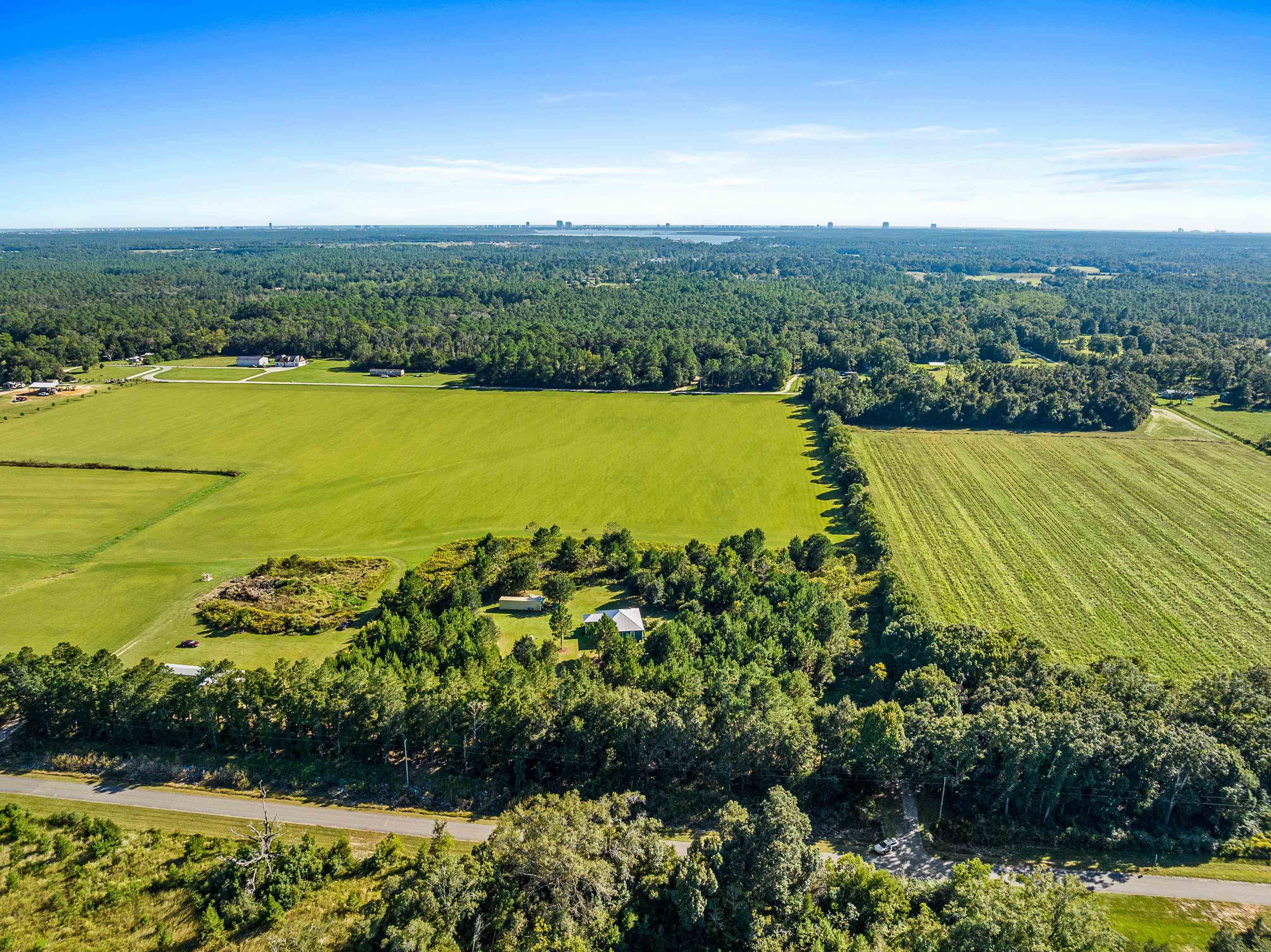 24616 Bretz Lane Elberta, AL 36530 - Photo 2 of 42 Drone view highlighting property and surrounding countryside.