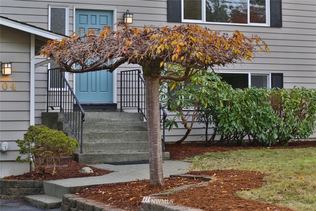 404 170th Place Southwest Bothell, WA 98012 - Photo 2 of 25 a view of a house with a yard