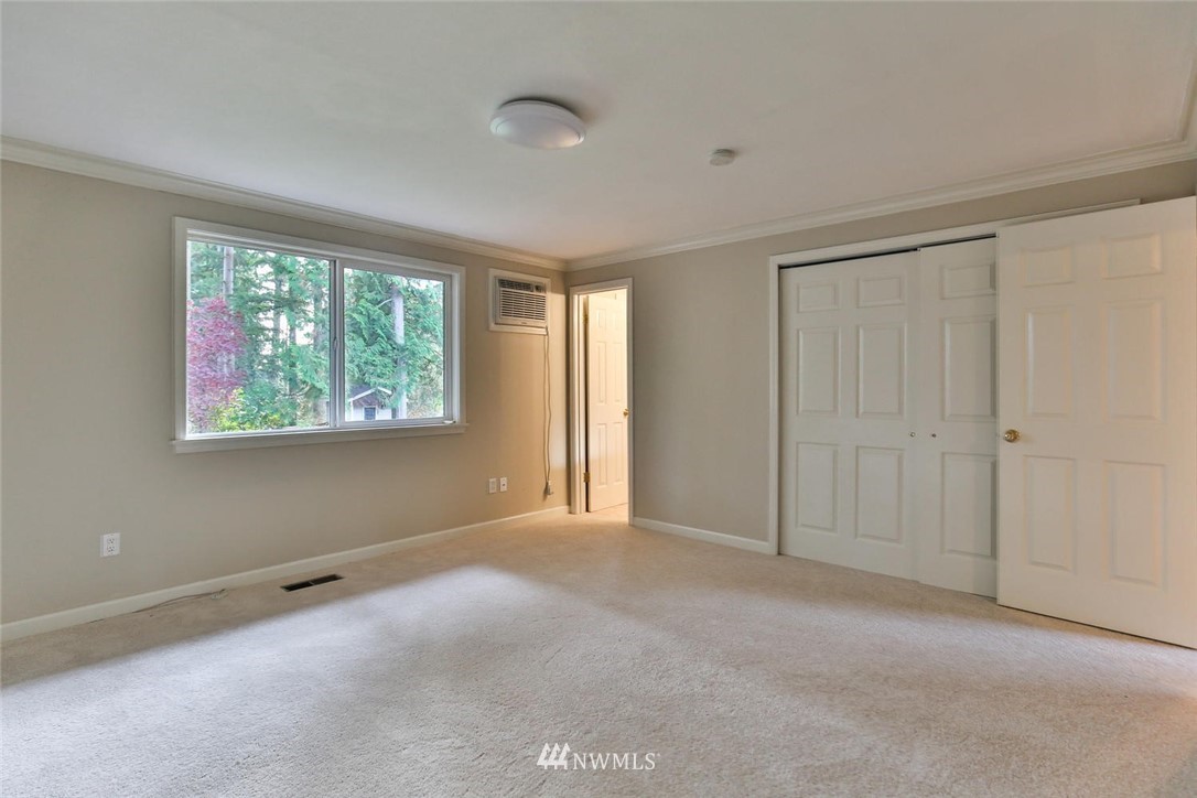 404 170th Place Southwest Bothell, WA 98012 - Photo 13 of 25 a view of an empty room with a window