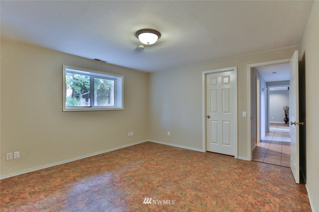 404 170th Place Southwest Bothell, WA 98012 - Photo 19 of 25 a view of an empty room with closet and a bathroom