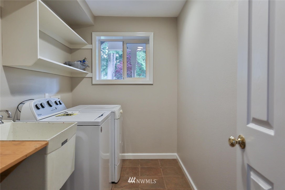 404 170th Place Southwest Bothell, WA 98012 - Photo 21 of 25 a utility room with dryer and washer