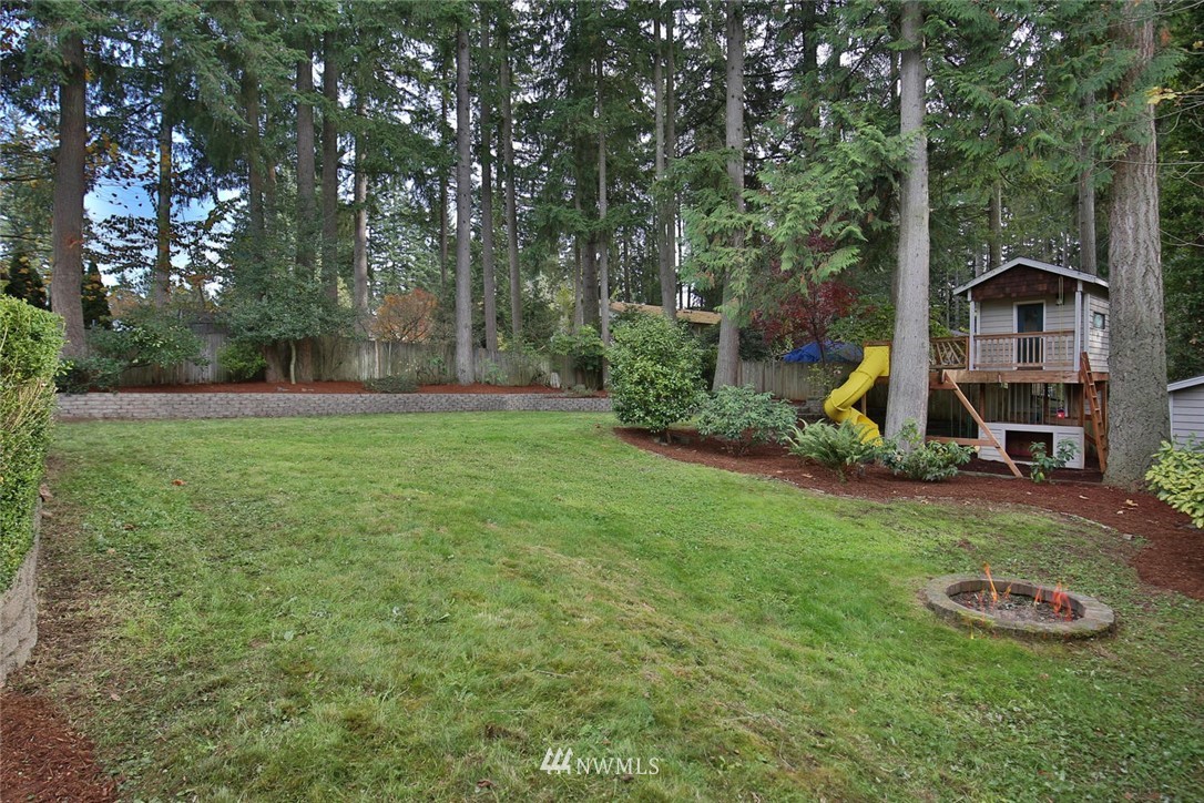 404 170th Place Southwest Bothell, WA 98012 - Photo 22 of 25 a view of a house with backyard and garden