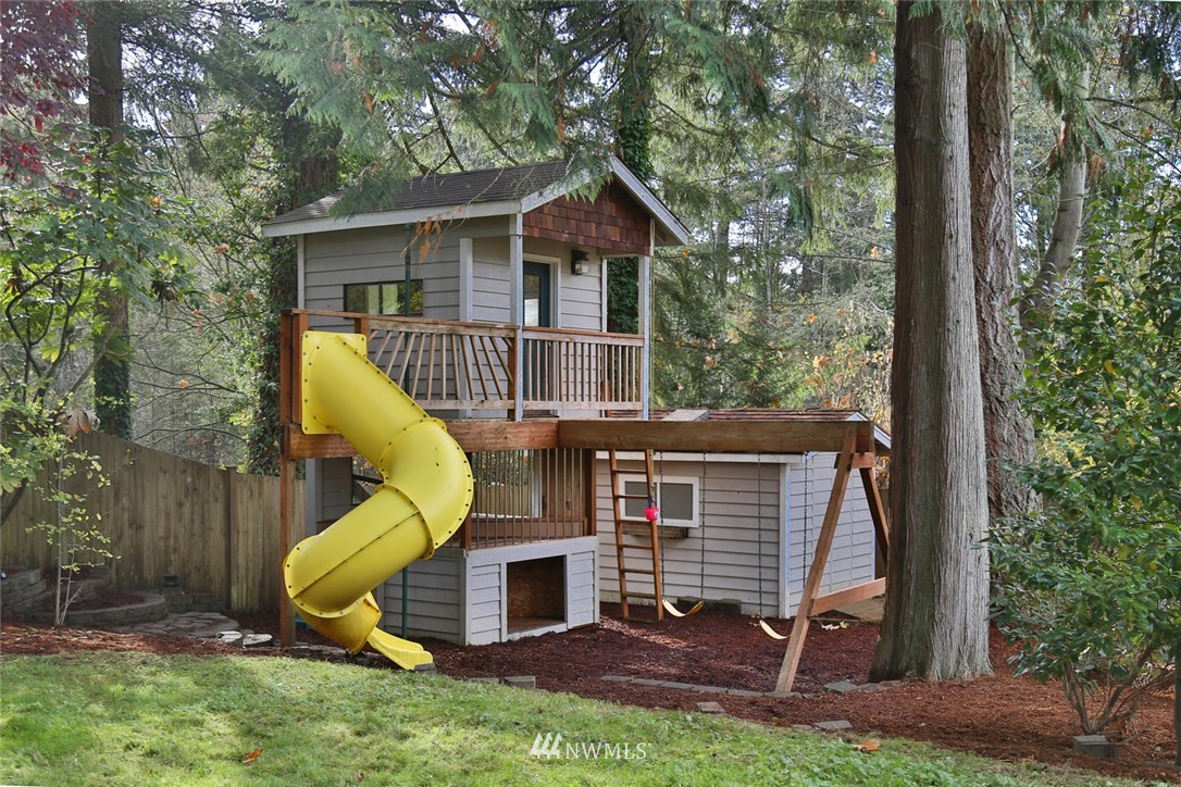 404 170th Place Southwest Bothell, WA 98012 - Photo 24 of 25 a view of a house with a backyard and a tree