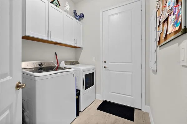 a view of a chair and table in the patio