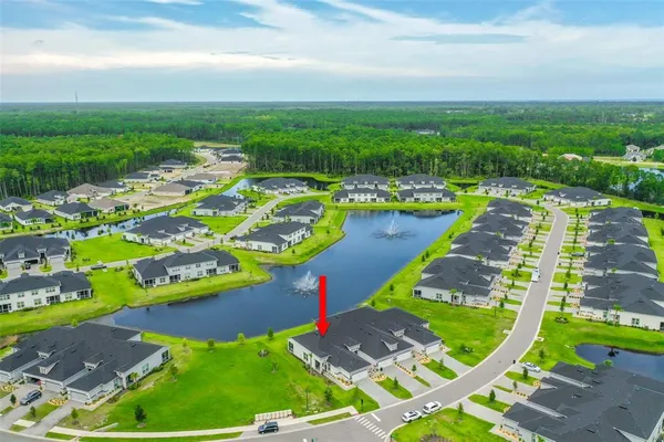 an aerial view of a house having yard
