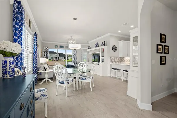 a view of a dining room with furniture