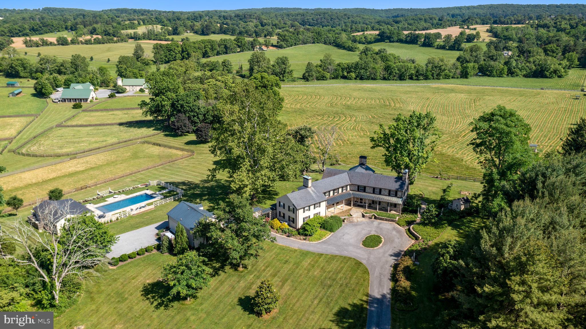 14111 Green Road Glyndon, MD 21136 - Photo 1 of 146 an aerial view of residential houses with outdoor space and river