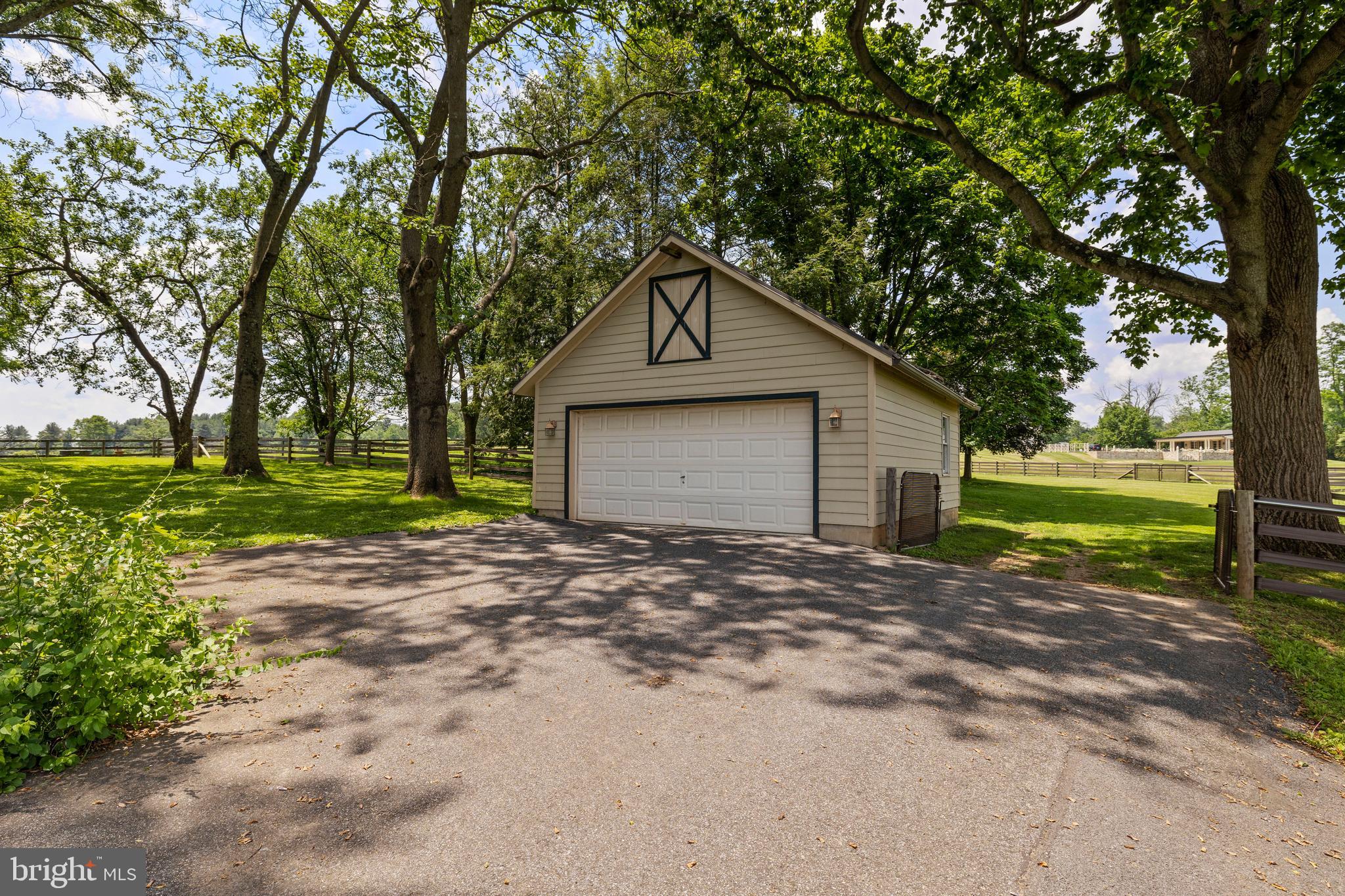 14111 Green Road Glyndon, MD 21136 - Photo 114 of 146 a front view of a house with a yard and garage