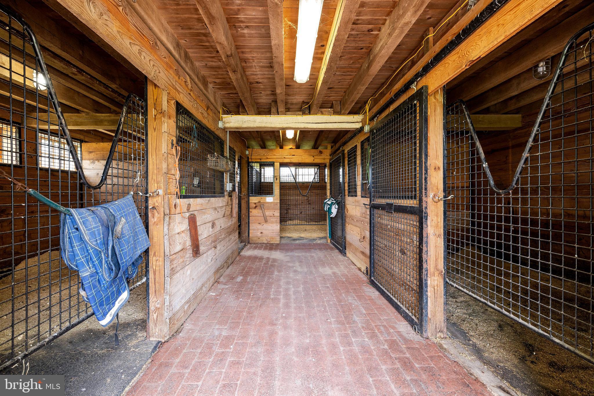14111 Green Road Glyndon, MD 21136 - Photo 133 of 146 a view of a porch with wooden floor and brick walls