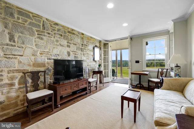 a kitchen with stainless steel appliances granite countertop a stove and cabinets