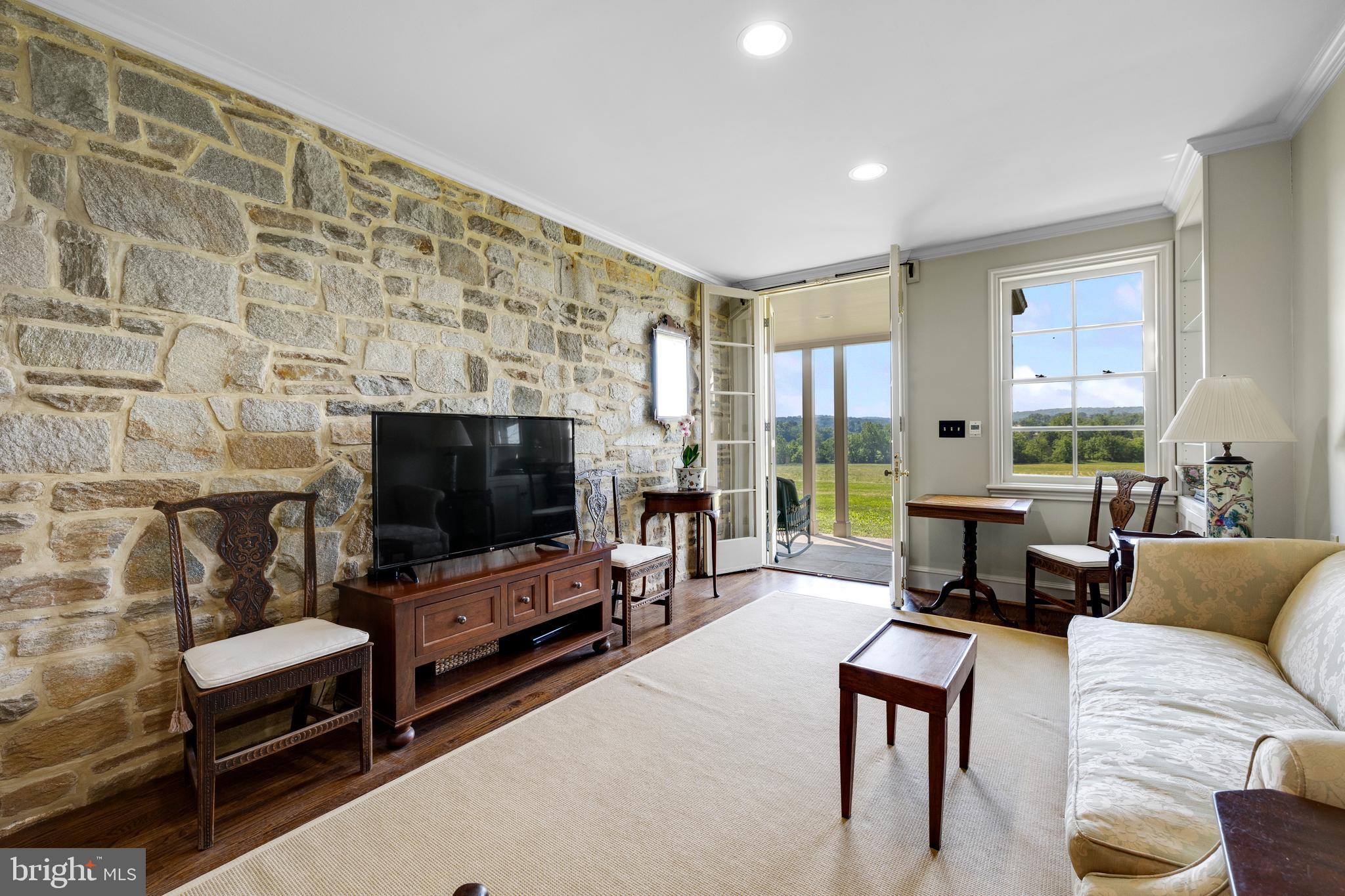 14111 Green Road Glyndon, MD 21136 - Photo 19 of 146 a living room with furniture and a flat screen tv