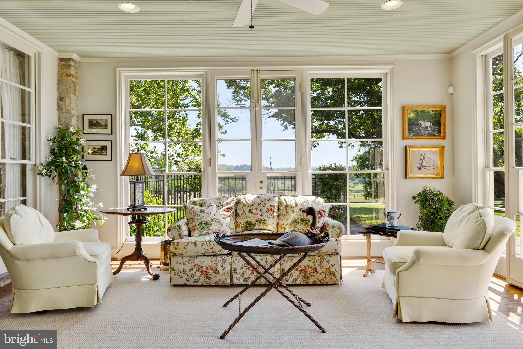 14111 Green Road Glyndon, MD 21136 - Photo 26 of 146 a living room with furniture and floor to ceiling windows