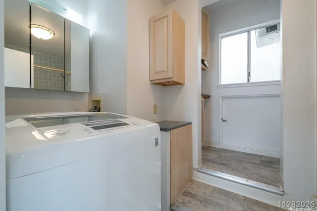 a utility room with washer and dryer