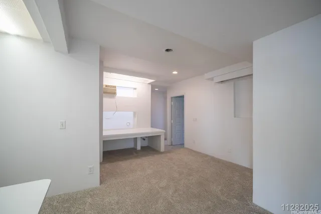 a view of room with air conditioner and window