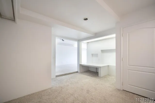 a view of workspace and bathroom