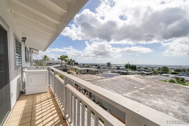 a view of a bathroom with a sink and dishwasher