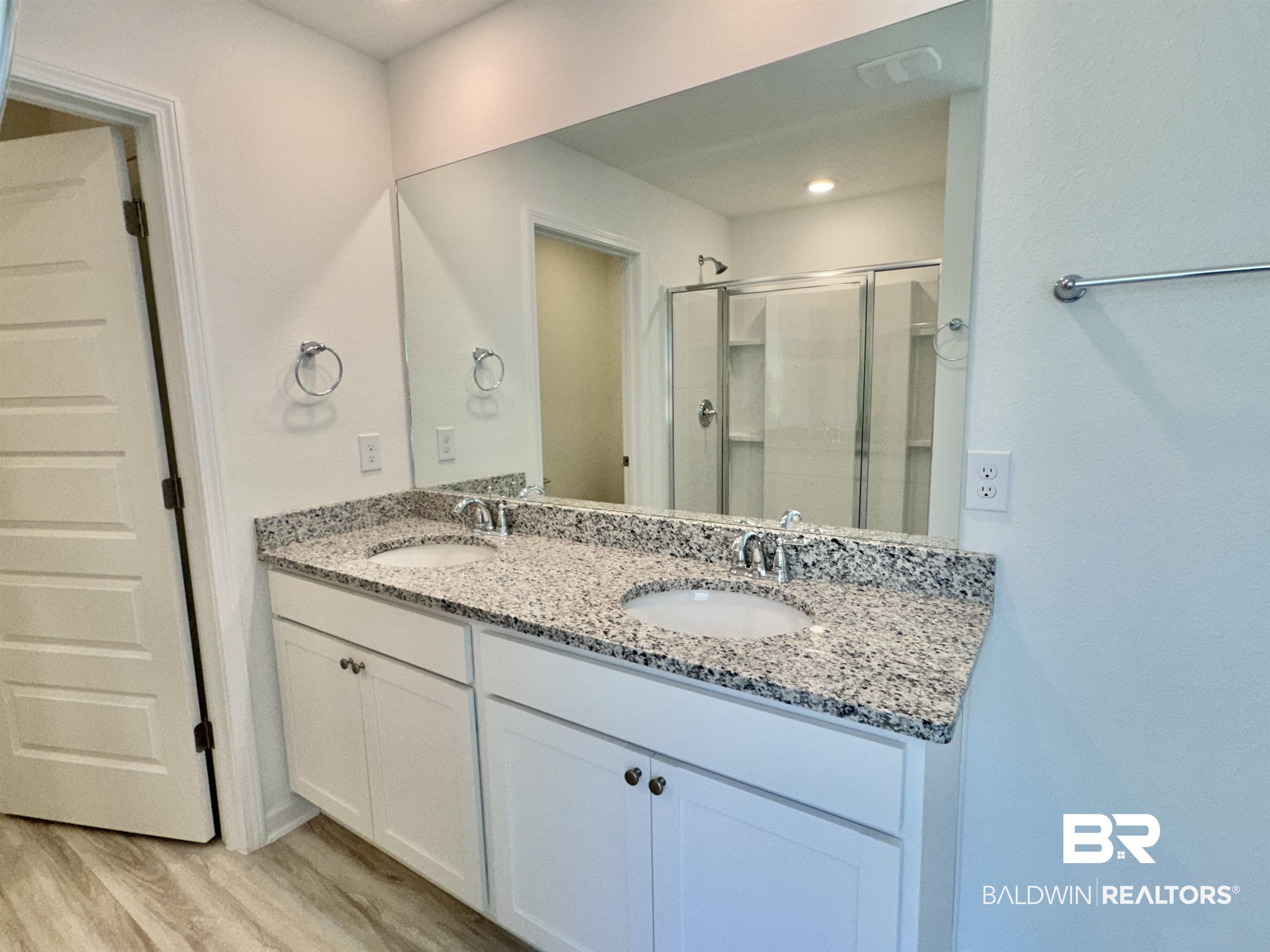22072 Aleutian Avenue Foley, AL 36535 - Photo 23 of 47 Full bathroom featuring double vanity, walk in shower with glass doors, large soaking tub, separate water closet