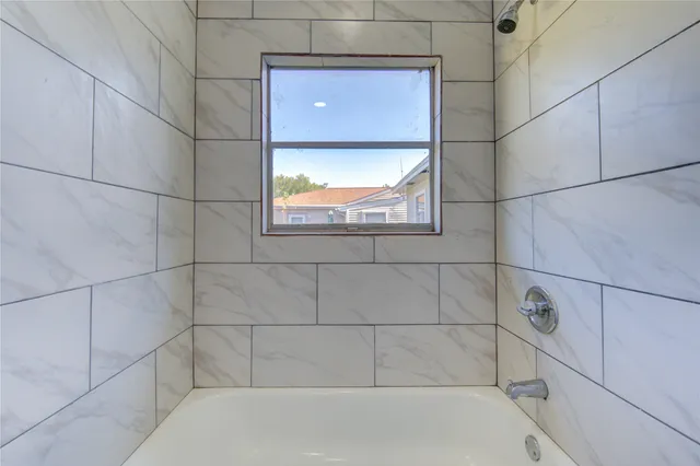 a bathroom with a bathtub