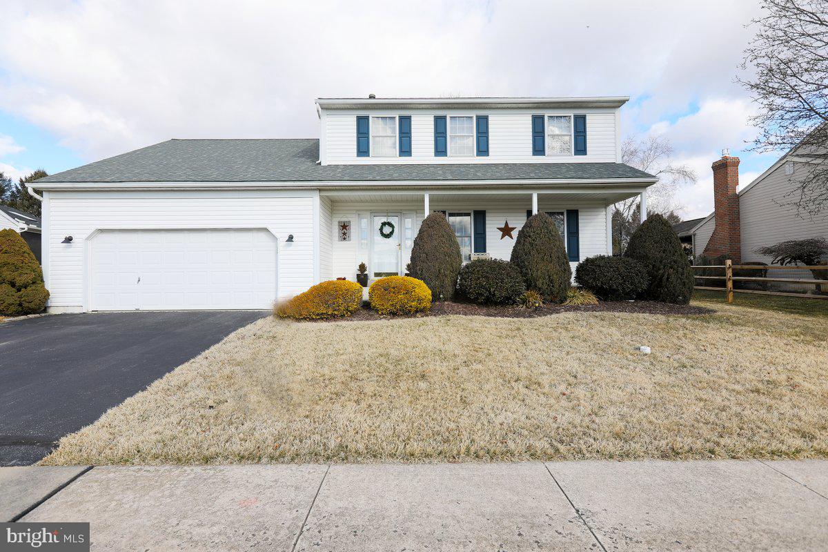 9 Roxberry Drive Reading, PA 19608 - Photo 1 of 40 a front view of a house with garden