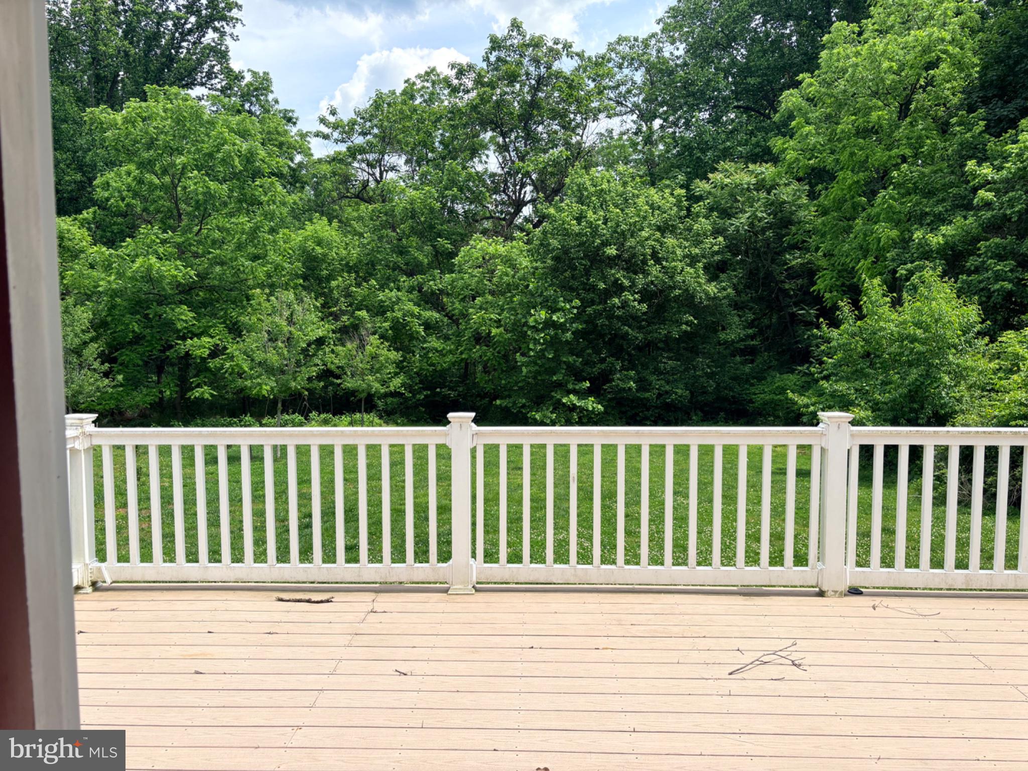2831 Reckord Road Fallston, MD 21047 - Photo 7 of 8 Serene deck overlooking lush greenery.