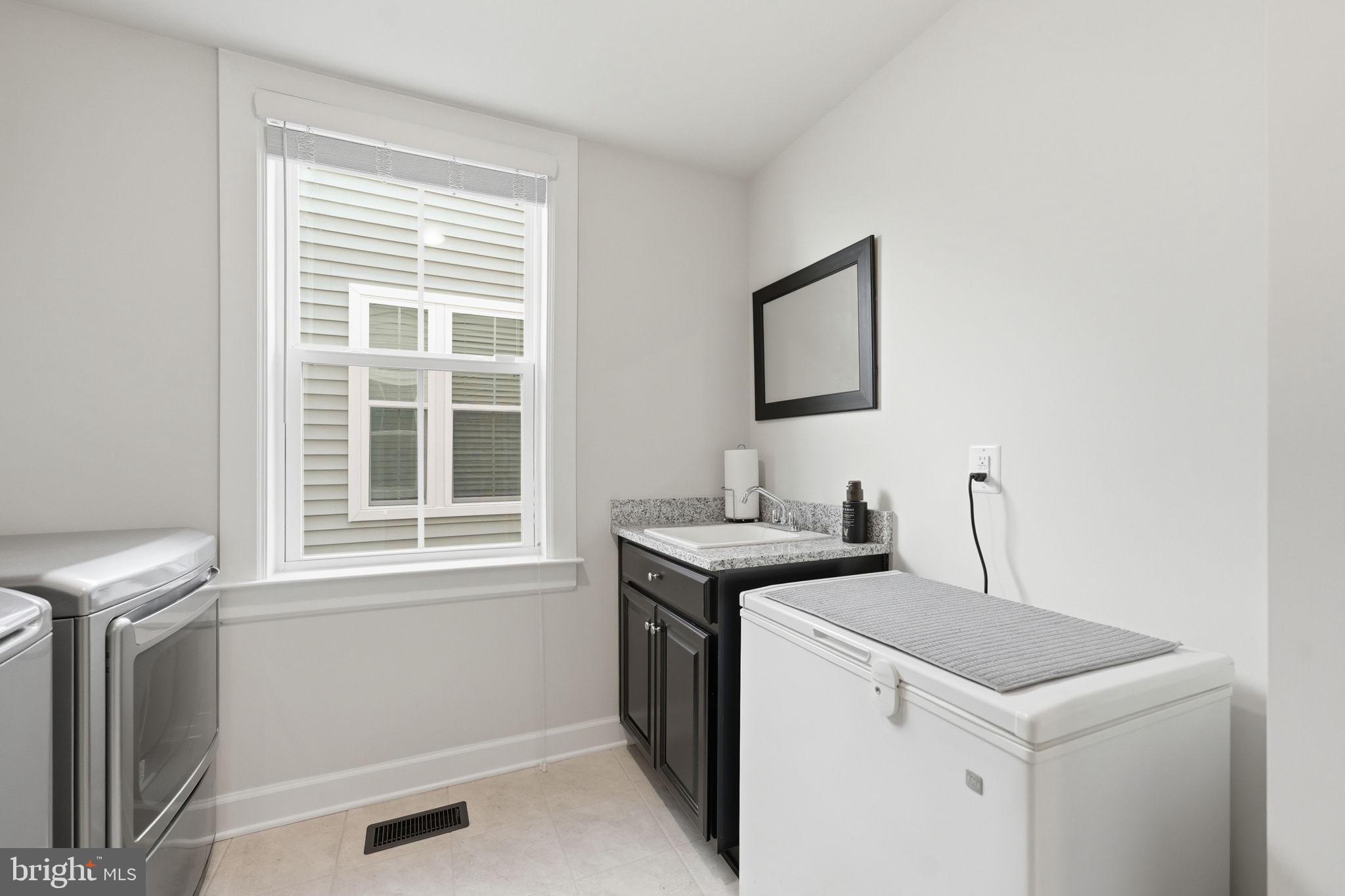 1488 Catbriar Way Odenton, MD 21113 - Photo 12 of 49 Laundry room w/utility sink & freezer
