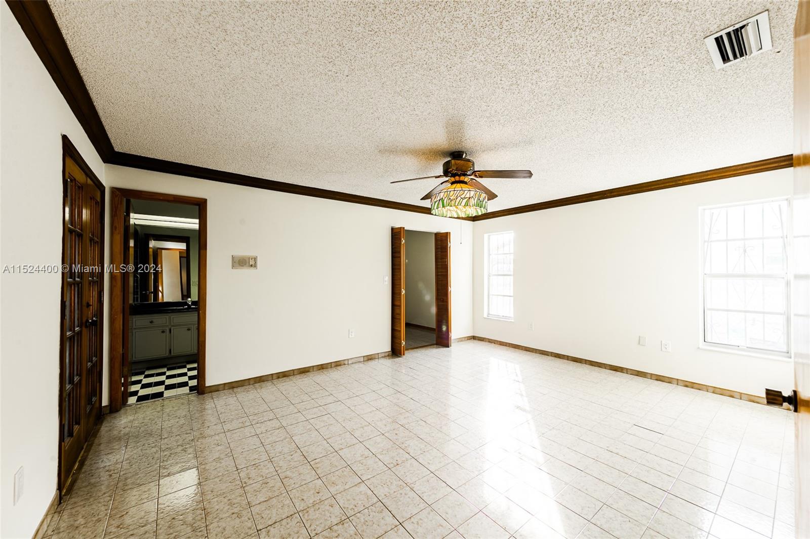 10448 Southwest 23rd Street Miami, FL 33165 - Photo 22 of 35 a view of an empty room