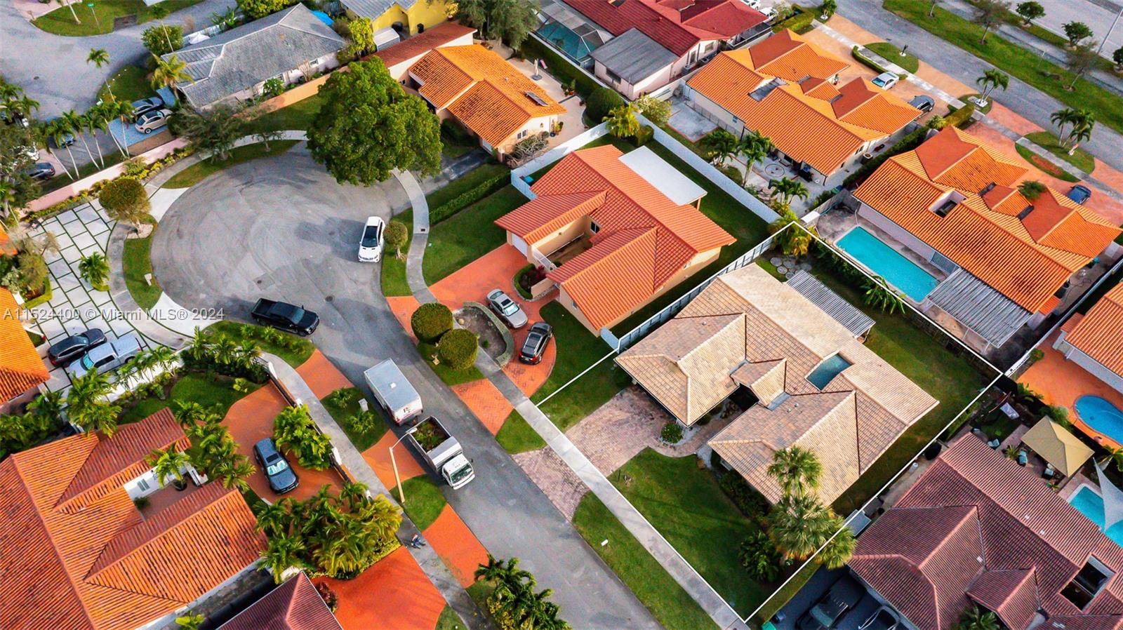 10448 Southwest 23rd Street Miami, FL 33165 - Photo 5 of 35 an aerial view of a house with a yard and plants