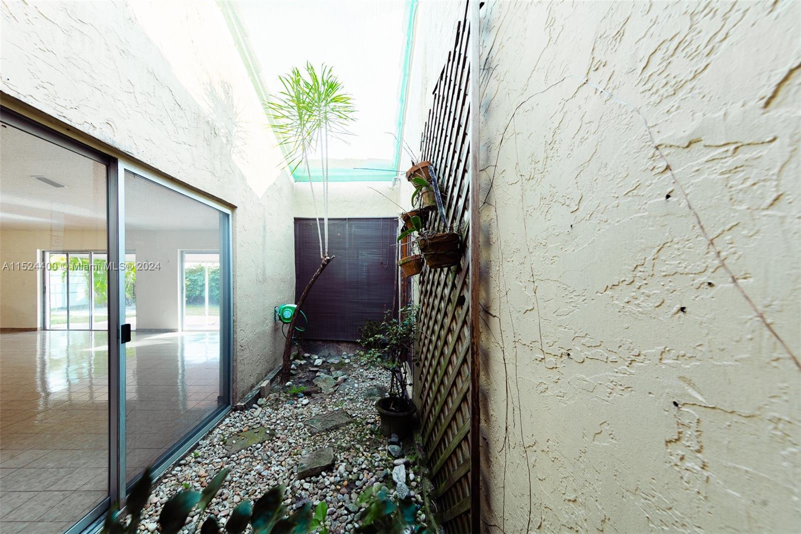 10448 Southwest 23rd Street Miami, FL 33165 - Photo 10 of 35 en suite bathroom with shower