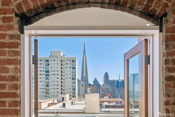 a picture of a glass door with a view of bathroom