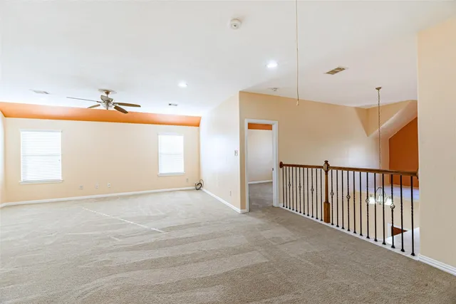 a view of a livingroom with a staircase