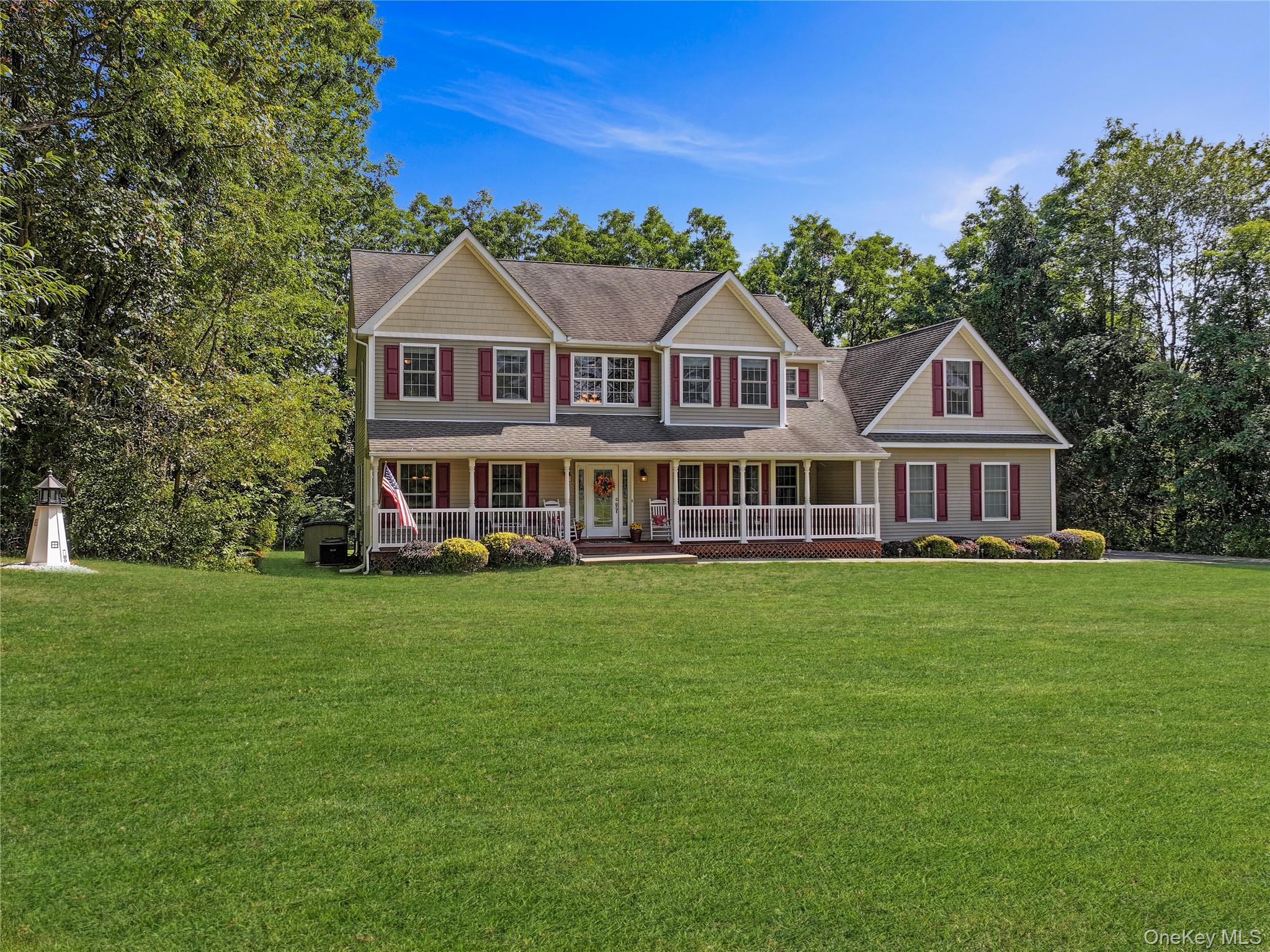 a front of a house with a garden