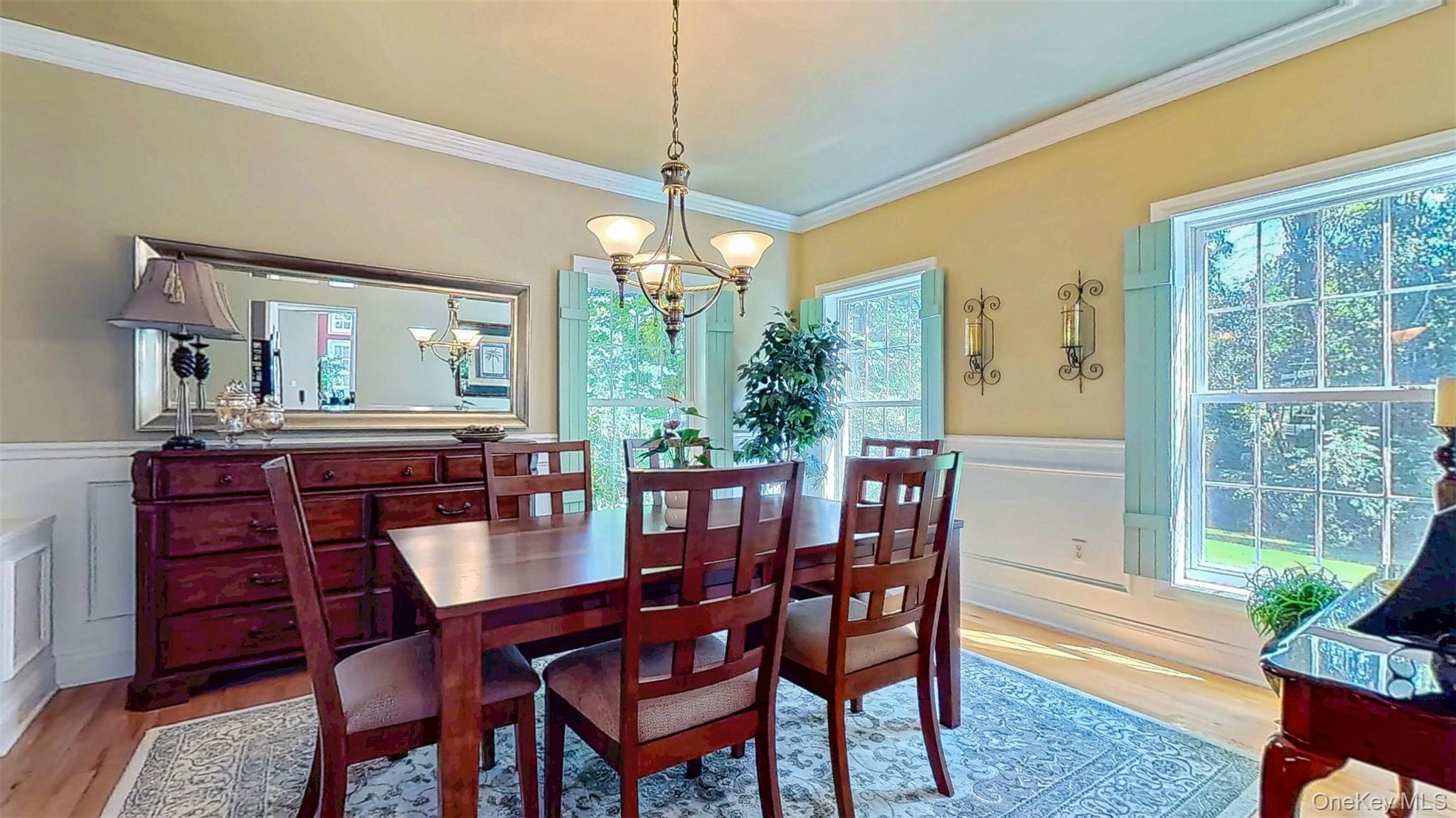 28 Madison Court Wallkill, NY 12589 - Photo 11 of 44 a view of a dining room with furniture window and outside view