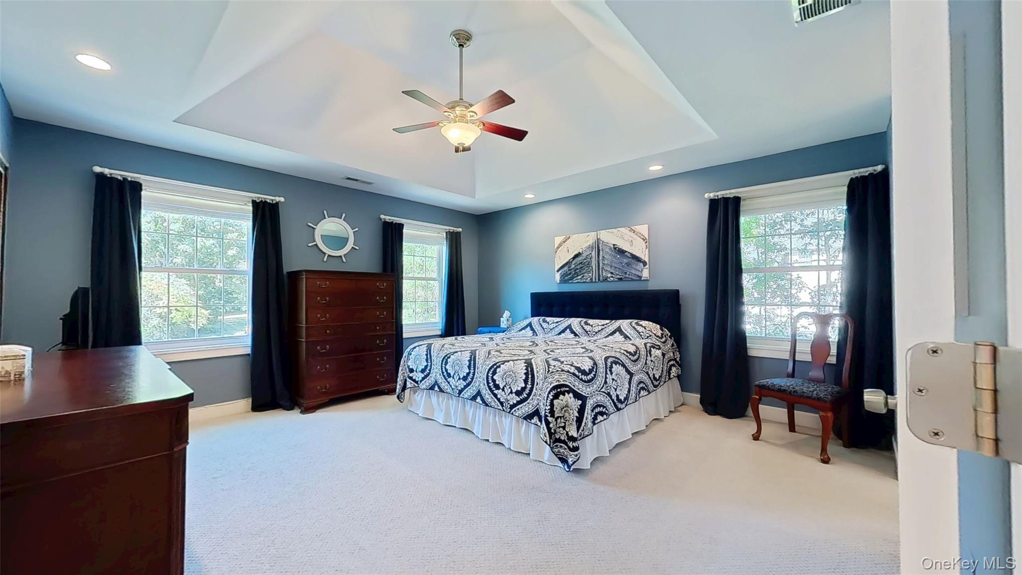 28 Madison Court Wallkill, NY 12589 - Photo 27 of 44 a bedroom with a large bed and a window