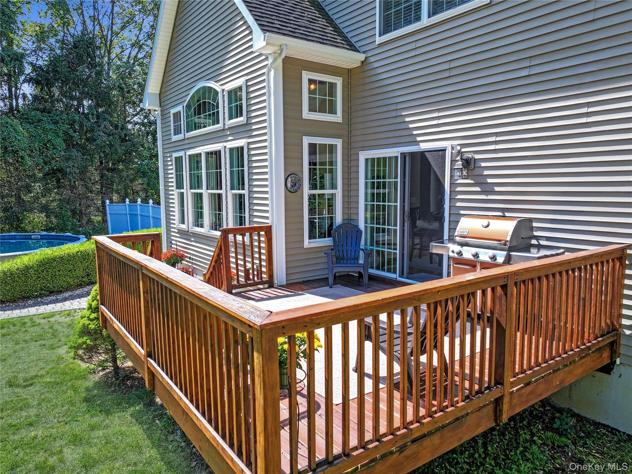 28 Madison Court Wallkill, NY 12589 - Photo 40 of 44 a view of a chairs and deck