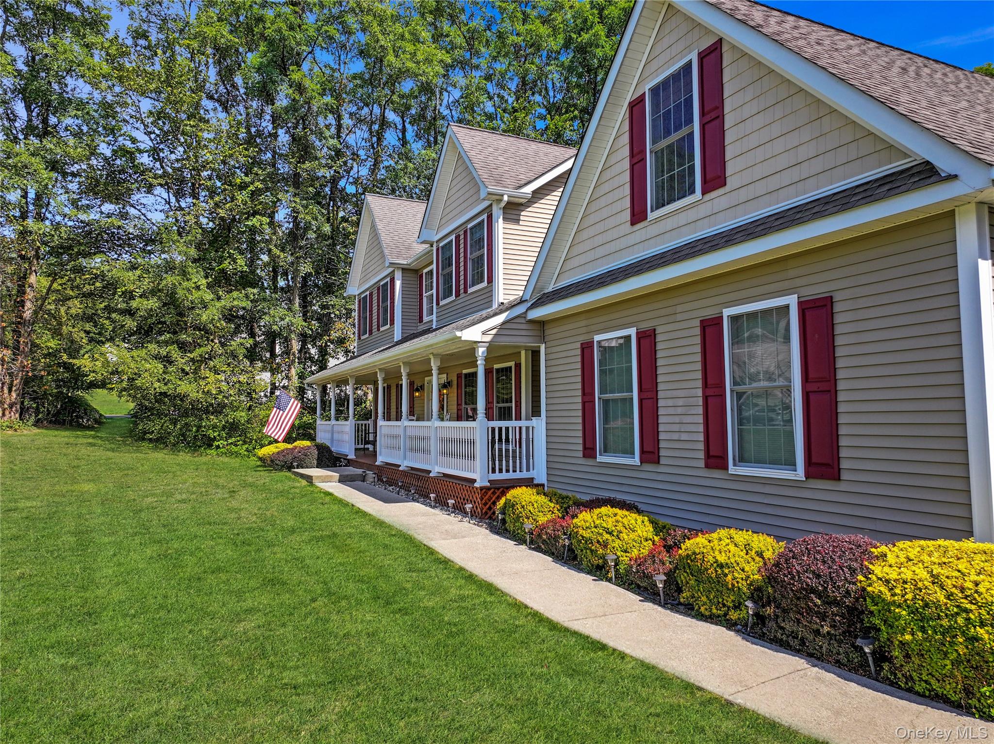 28 Madison Court Wallkill, NY 12589 - Photo 41 of 44 a view of a house with a swimming pool and a yard